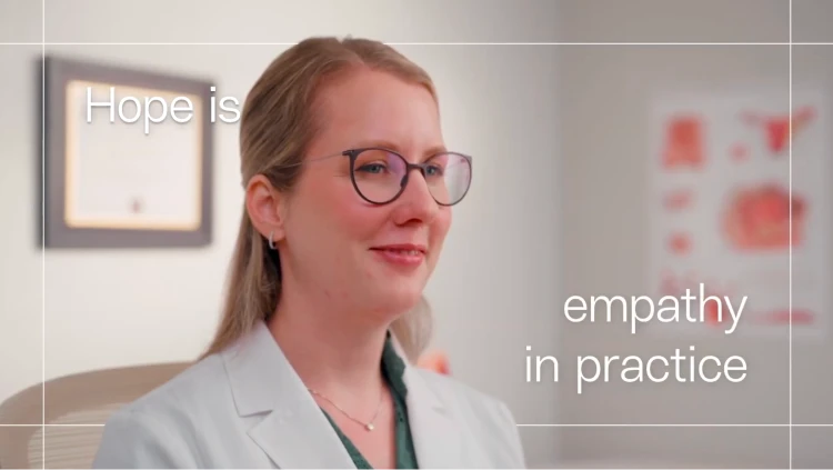 Hope is Radical: What experts wish you knew 5 Sitting at her desk, Dr. Fran smiles. The words read “Hope is empathy in practice.”