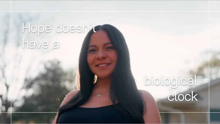 Karla stands in sunlight as the text reads, ‘Hope doesn’t have a biological clock.’